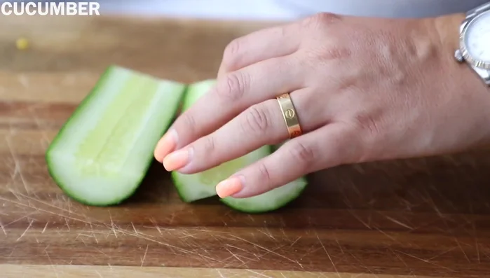 Slice cucumber into matchstick shapes, discarding the watery middle part.