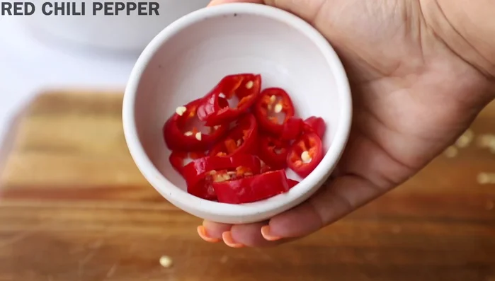 Optionally, add chopped red chili pepper.