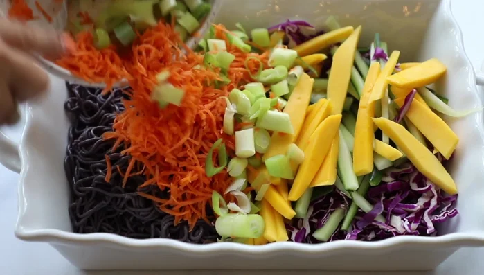 Add half the dressing, mix well, then add the remaining dressing and toss until evenly coated.