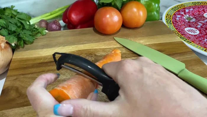 Prepare vegetables: julienne the carrot, slice green onions lengthwise, thinly slice Thai pepper, garlic, shallot, tomatoes, and bell peppers. Thinly slice kaffir lime leaves. Thinly slice onion.