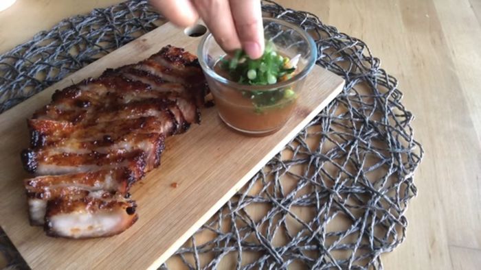 Prepare the Nam Jim Jaew (dipping sauce): (Instructions for making Nam Jim Jaew are not explicitly detailed in the transcript but are referenced; please refer to the video or a separate recipe.)