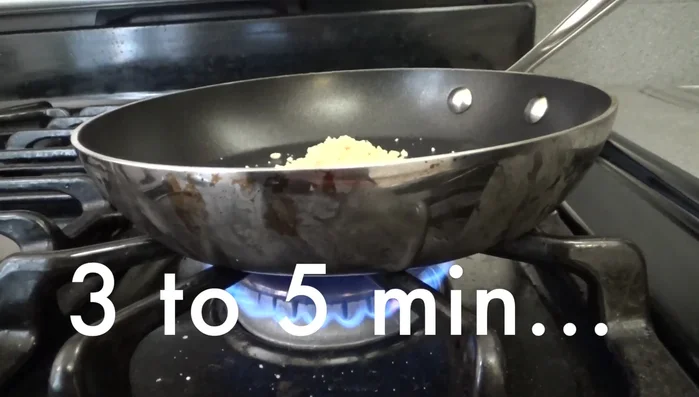 Roast peanuts in a pan over medium heat for 5 minutes. Set aside.