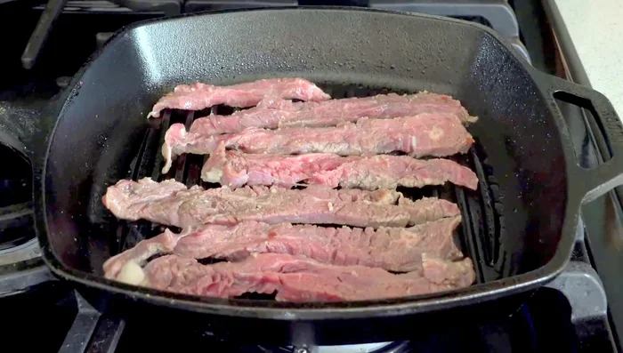 Cook the beef in a hot skillet or grill pan for 1-2 minutes per side.