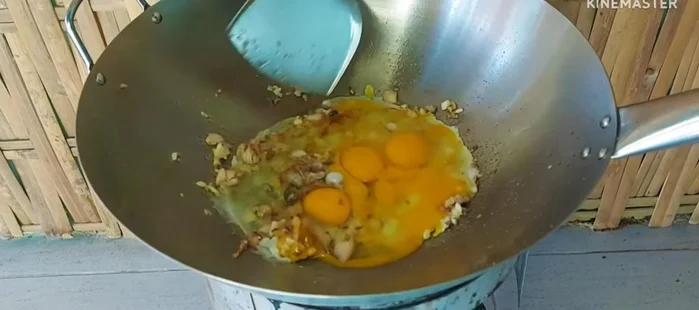 Add the eggs and stir until cooked.