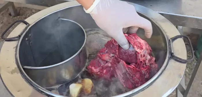 Bring to a boil and add the beef.