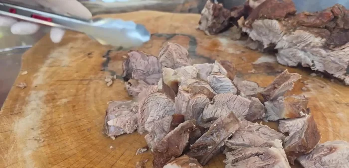 Simmer for approximately 3 hours and 20 minutes until meat is tender.