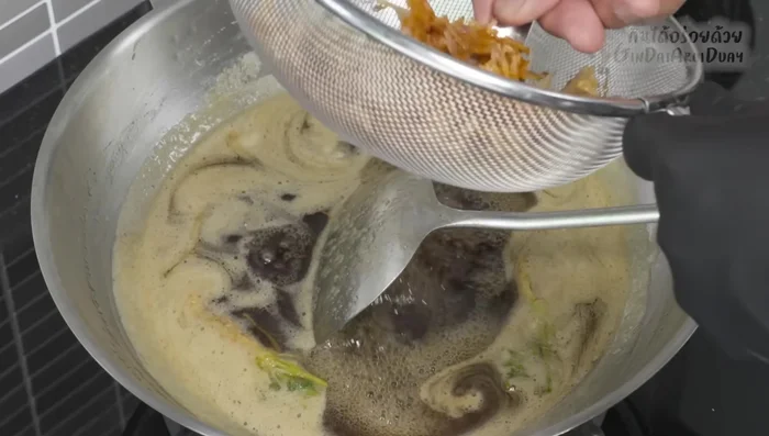 Combine & Finish: Add the fried shallots and chilies to the sweet fish sauce. Simmer for a few more minutes until the sauce reaches your desired consistency.