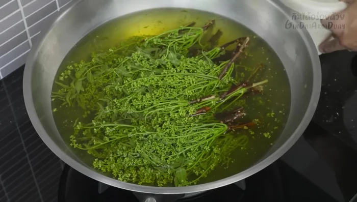 Shock the neem: Immediately transfer the blanched neem to a bowl of cold water to retain color and freshness.