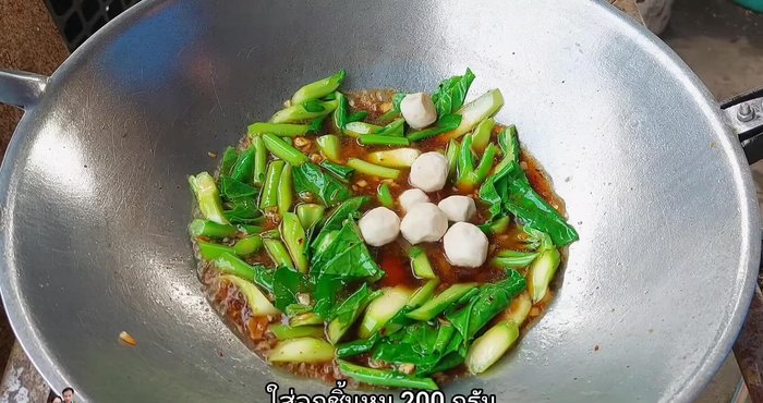 Add meatballs and stir-fry.
