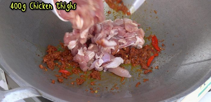 Add chicken and stir-fry until partially cooked.
