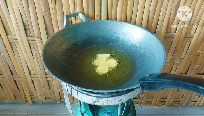 Fry the egg tofu until golden and crispy.