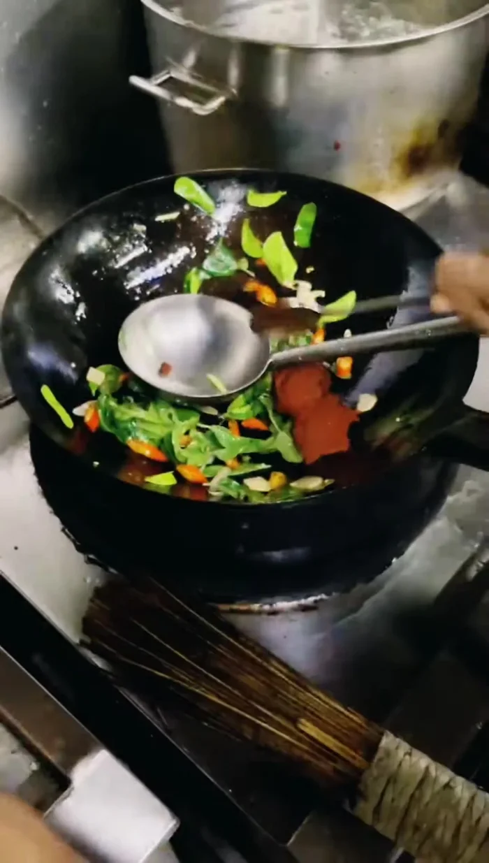 Add the red curry paste.