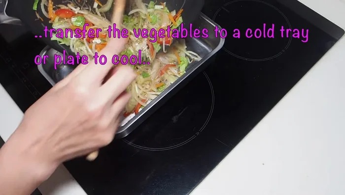 Allow the vegetable mixture to cool on a plate or tray.