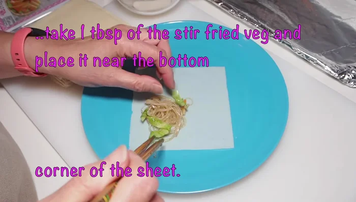 Assemble the spring rolls using the cooled vegetable mixture and spring roll wrappers.