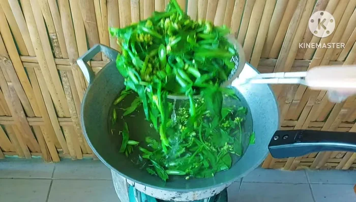 Once blanched, immediately remove the kale from the boiling water and rinse with cold water to stop the cooking process and maintain its vibrant color.