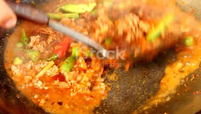 Add rice: Add the cooked rice and stir-fry until heated through.