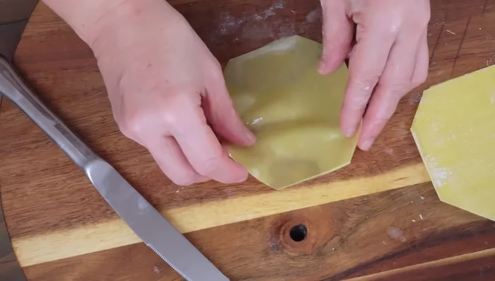 Steam ravioli in bamboo baskets lined with baking paper for 10 minutes.