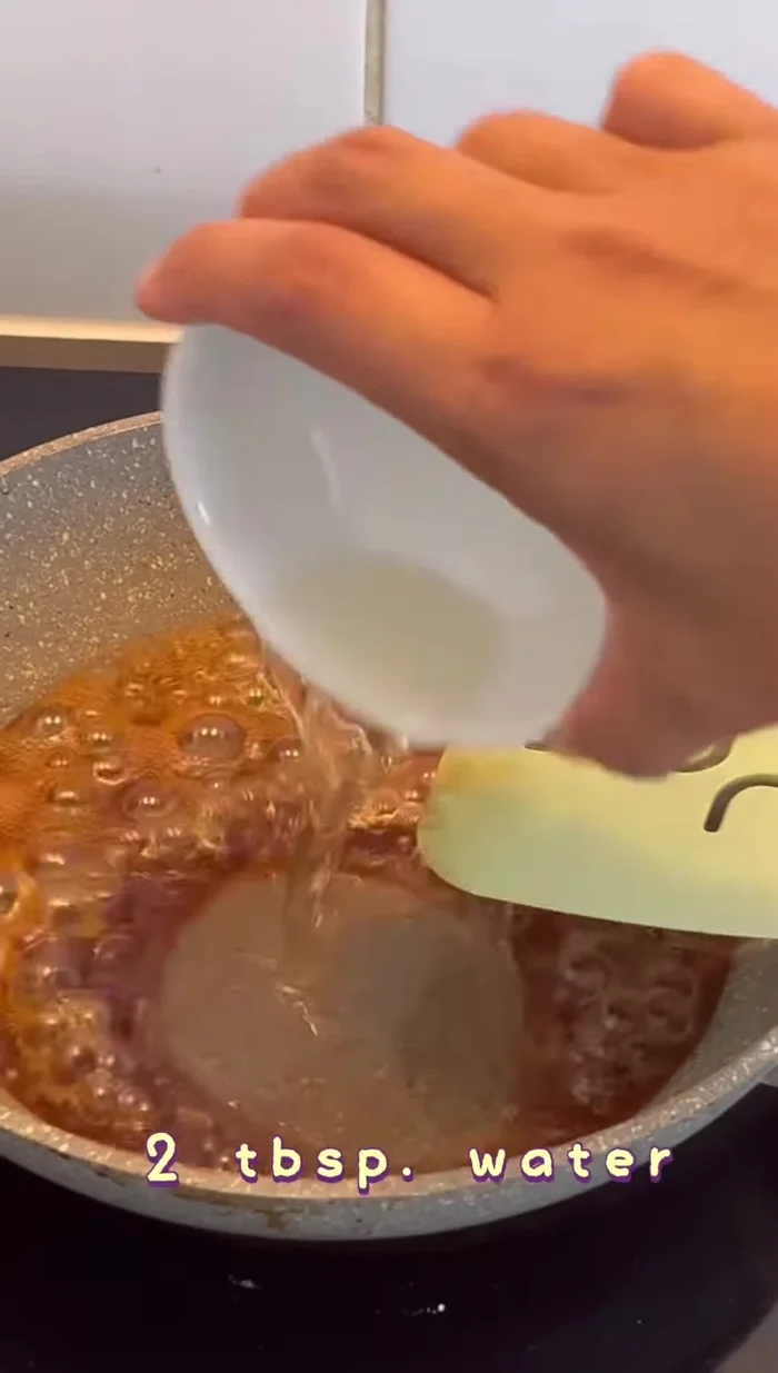 Make sweet and sour sauce: Combine palm sugar, fish sauce, salt, and water, simmer until desired texture. Add fried fish, mix well.