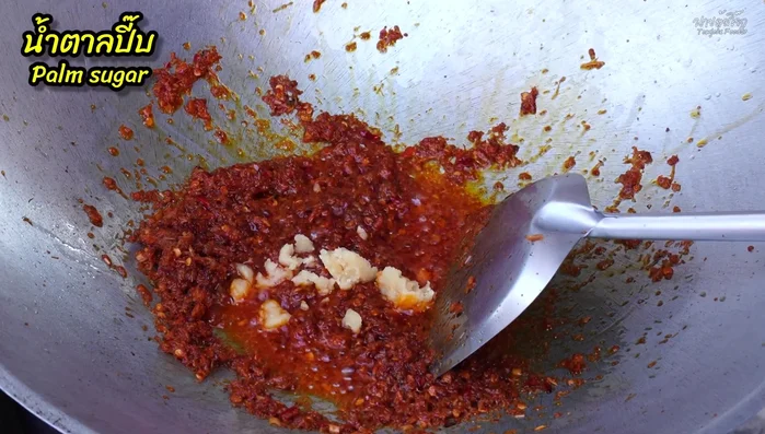 Add palm sugar and fish sauce. Stir-fry until the sugar dissolves.