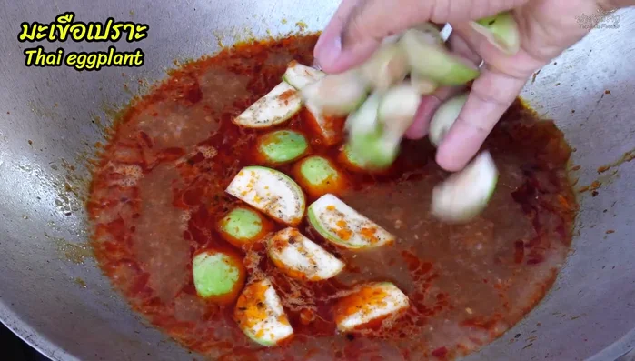 Bring to a boil, then add the eggplant.