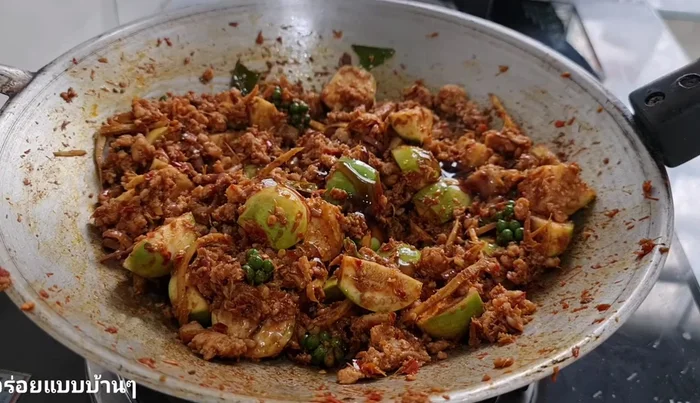 Season with oyster sauce, clams, water, and sugar (adjust sweetness to taste).