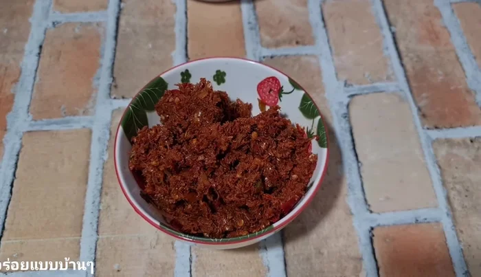 Prepare curry paste (recipe link provided in video description).