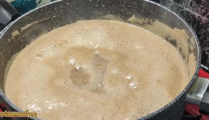 Add the shrimp, pumpkin, watermelon rind, and mushrooms to the boiling curry. Cover and cook until the vegetables are tender.