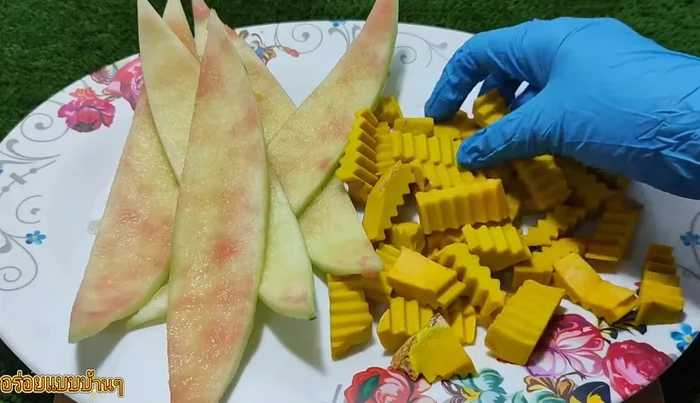 Prepare the pumpkin by cutting and washing it into bite-sized pieces.