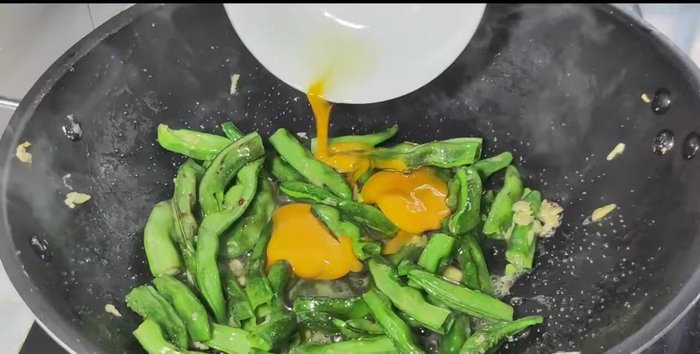 Add the eggs and continue stir-frying until cooked.