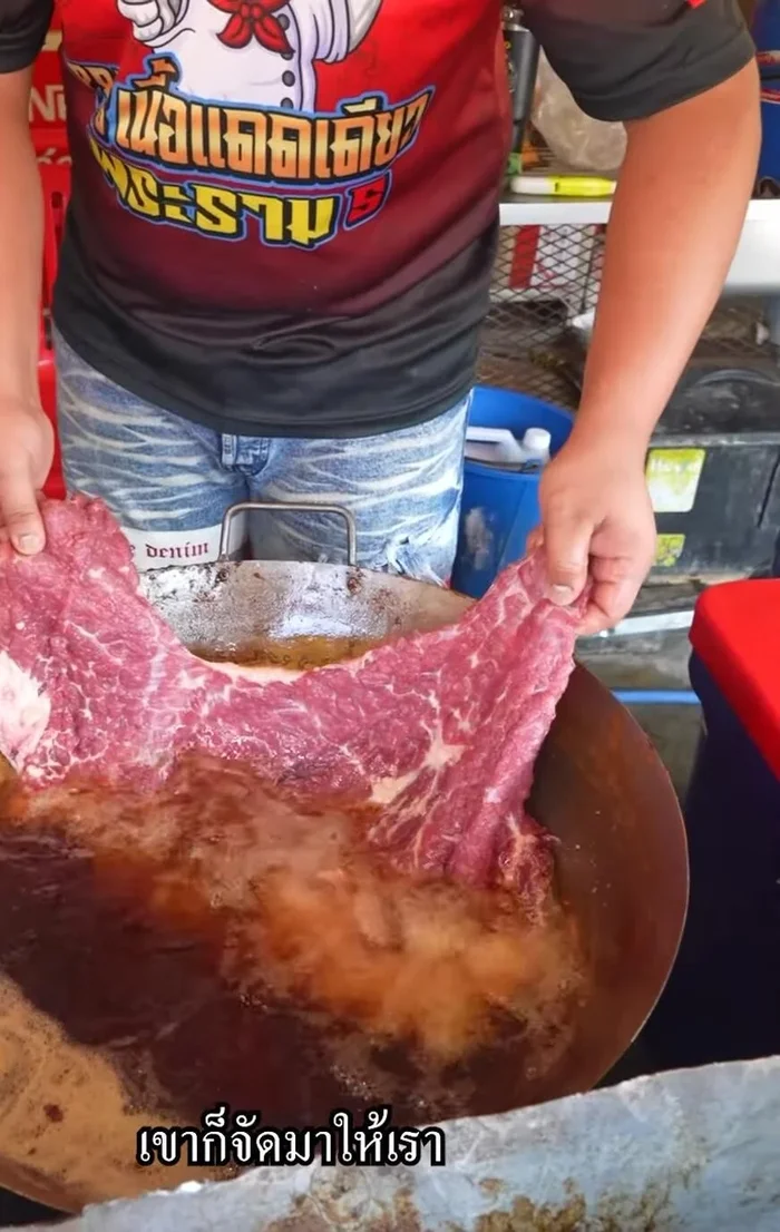 Fry the beef until golden brown and cooked through. The shop uses a specific technique that results in a 6-inch diameter piece of fried beef. More information is not available.