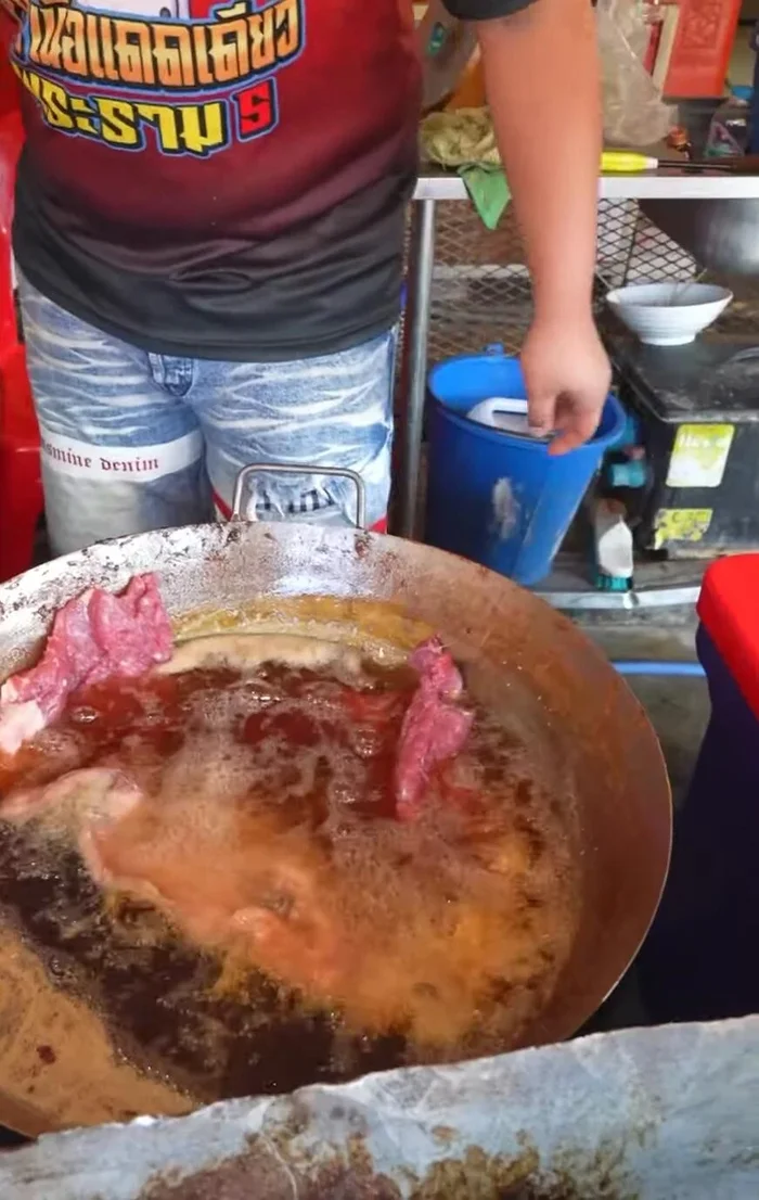 Marinate the sliced beef for approximately 20 minutes.