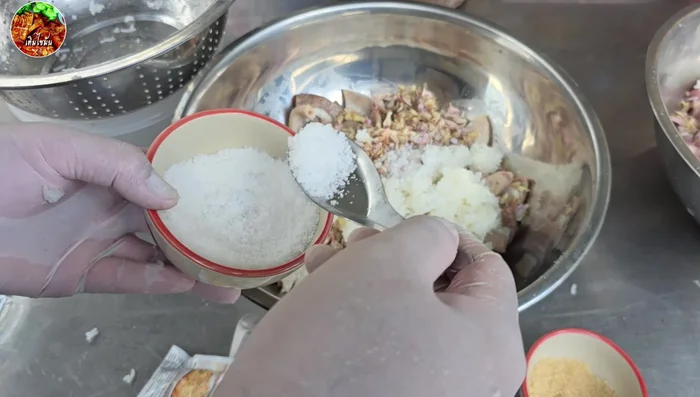 Prepare the filling mixture: Mix the filling ingredients, sticky rice, garlic, and salt.