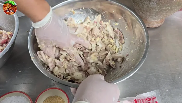 Stuff the sausage casings with the pork mixture and the filling mixture using a sausage stuffer.