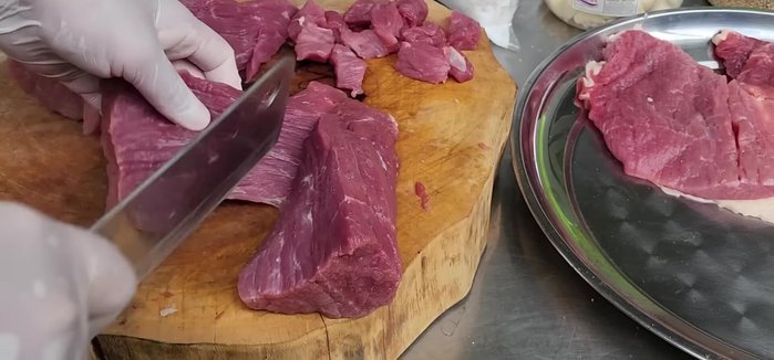 Grind or finely chop the meat and liver. If using a meat grinder, you can also add the garlic, lemongrass, and sticky rice at this stage.