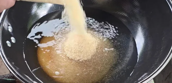 Prepare the marinade: Mix water, sugar, palm sugar, salt, green papaya sauce, fish sauce, and flavoring powder. Melt the sugar completely, but don't boil.