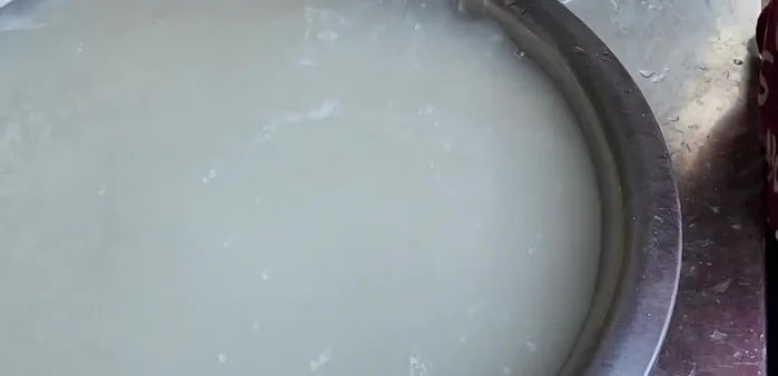 Steam the sticky rice until cooked.