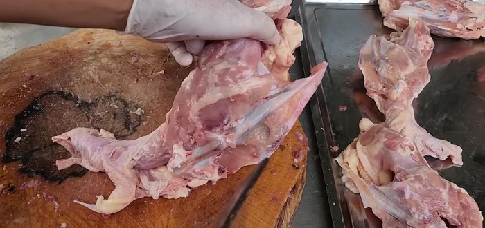 Chop the chicken frames, removing excess fat. Slightly chop the bones to make them easier to eat.