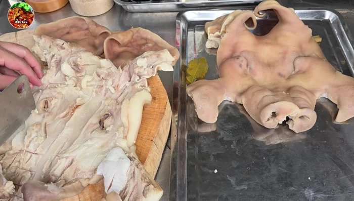 Make small notches in thicker parts of the pig mask to prevent it from bursting during grilling.