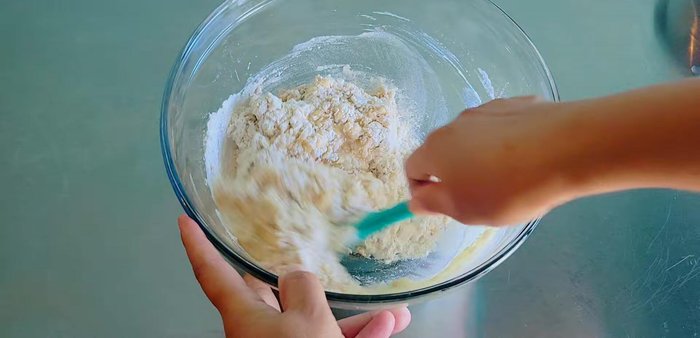 Knead the dough: Knead the dough for 1-2 minutes in the bowl, then knead on a surface for about 5 minutes until smooth. (70.24)