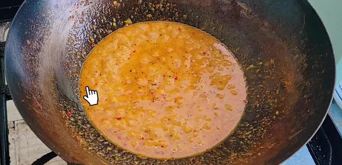 Gently add the fried fish to the curry and simmer for 1-2 minutes to allow the fish to absorb the flavors.