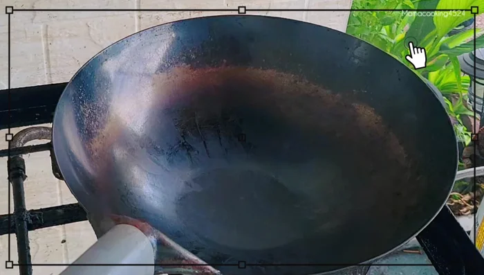 Heat pan on high heat until smoky. Add vegetable oil.