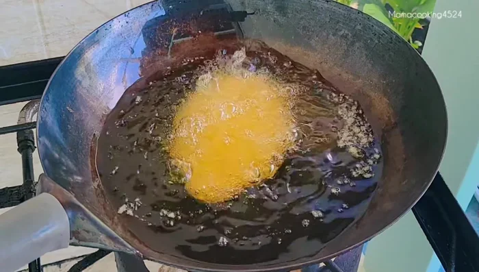 Fry the pork: Heat oil in a pan over medium heat. Fry the pork for about 5-6 minutes per side until golden brown and crispy.