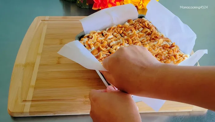 Remove from container/baking sheet and cut into pieces.
