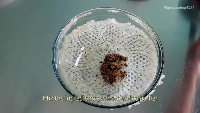 In a bowl, combine the pounded mixture, seasoning powder, light soy sauce, oyster sauce, and palm sugar. Mix until the sugar dissolves.