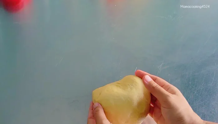 Divide the dough into 8 (or 6-10) equal pieces. Shape each piece into a ball.