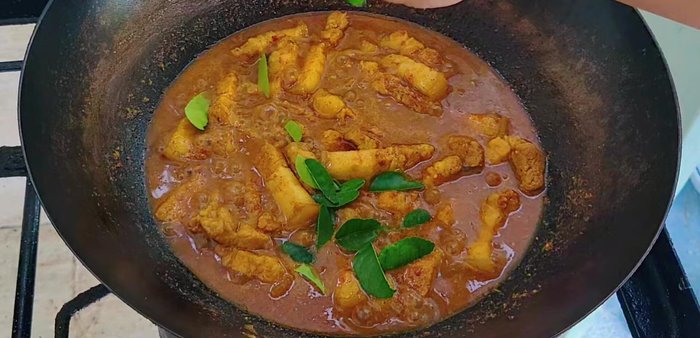 After 15 minutes, add kaffir lime leaves.