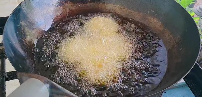 Carefully fry the shrimp balls in medium-low heat until golden brown and floating.