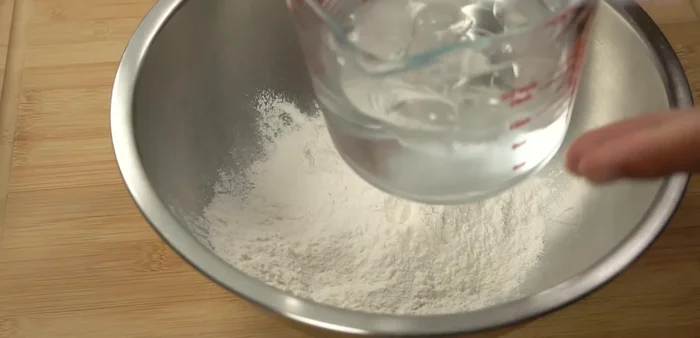 Prepare the batter: Mix UFM crispy fried flour with cold water until slightly thick and viscous (108.399). Add eggs for extra flavor and crispiness (149.92).