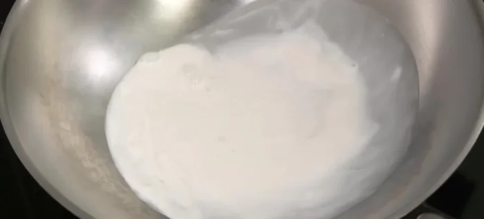 Make the Chu Chee sauce: Heat coconut milk in a pan until it starts to separate. Add the curry paste and stir-fry until fragrant.