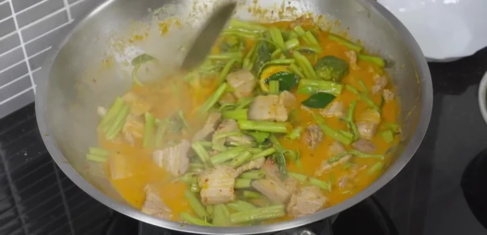 Add the prepared salted fish.